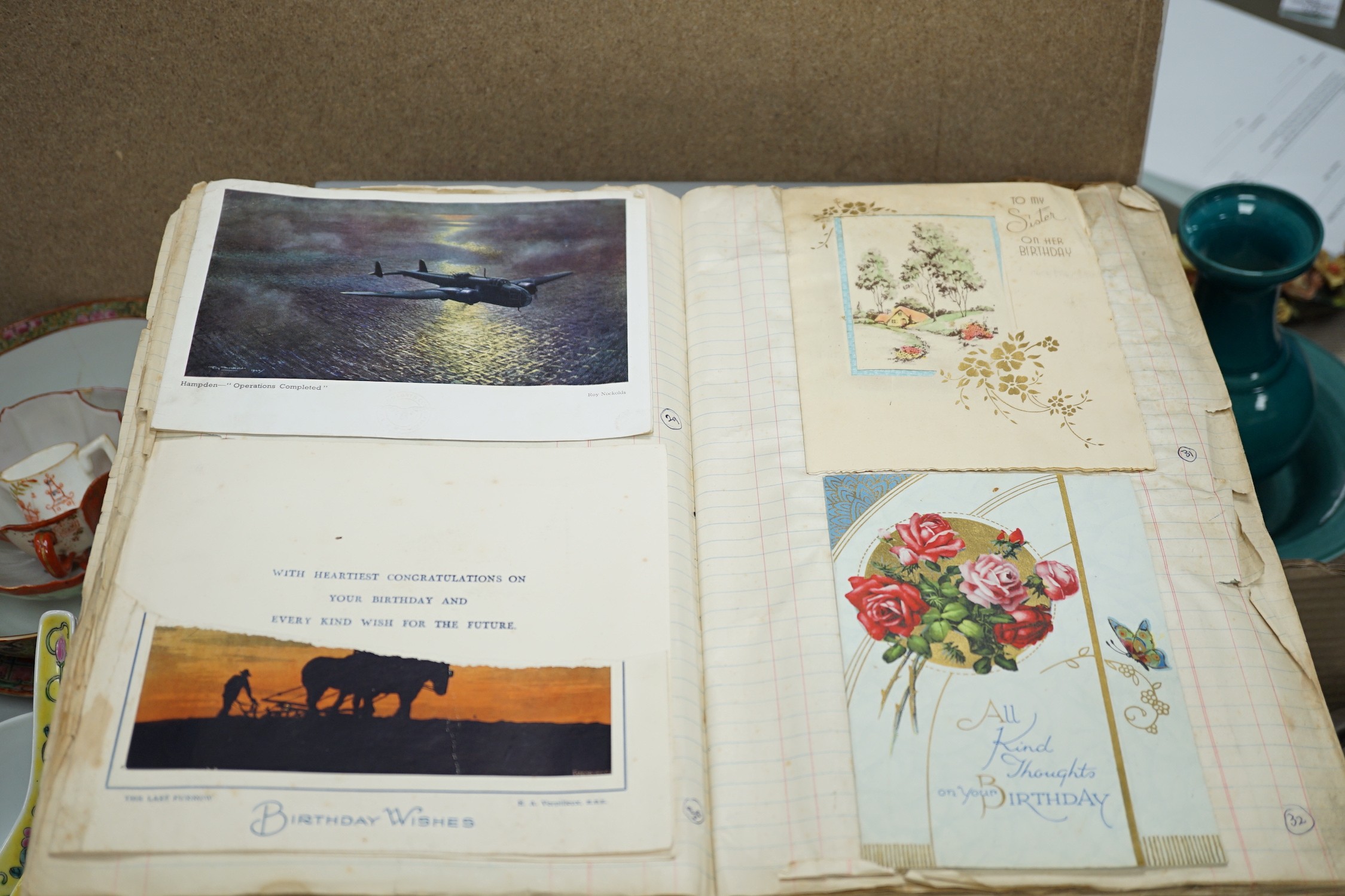 A collection of mixed ephemera, including 20th century comics, scrapbooks, newspapers, a photo album etc